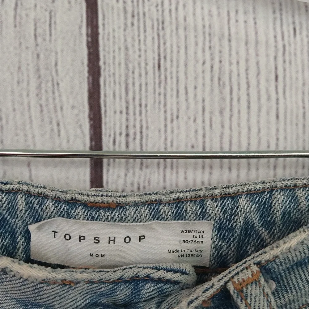 Top Shop distressed knee mom jeans size 28